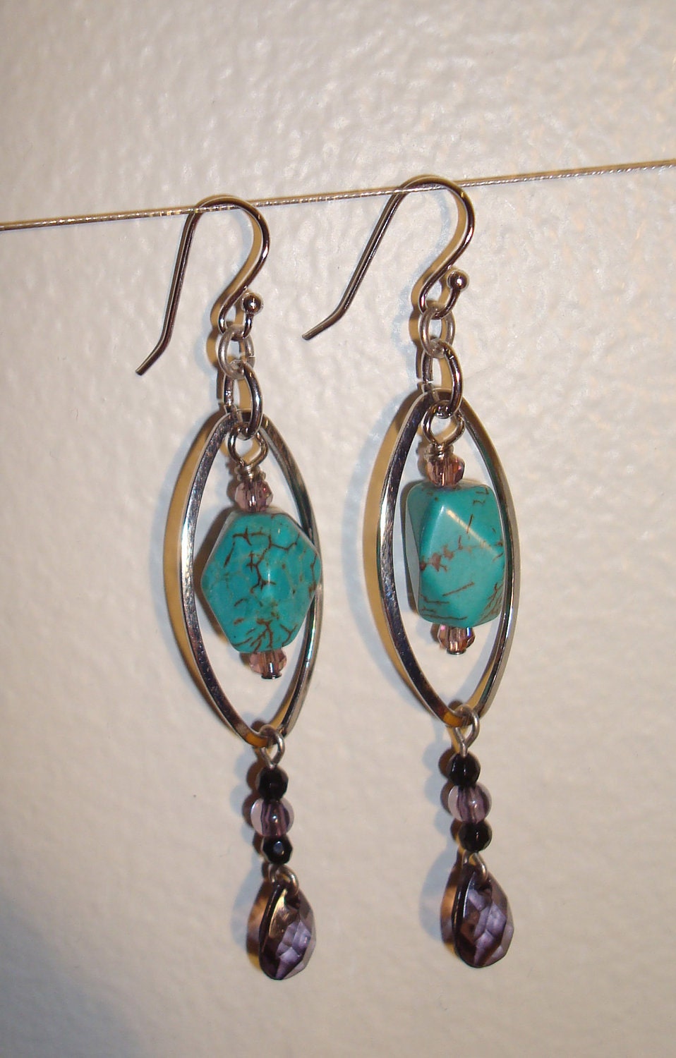 Silver oval hoops, turquoise beads and crystals