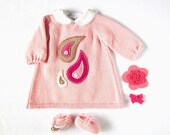 A knitted baby dress with paisley in felt - made to order