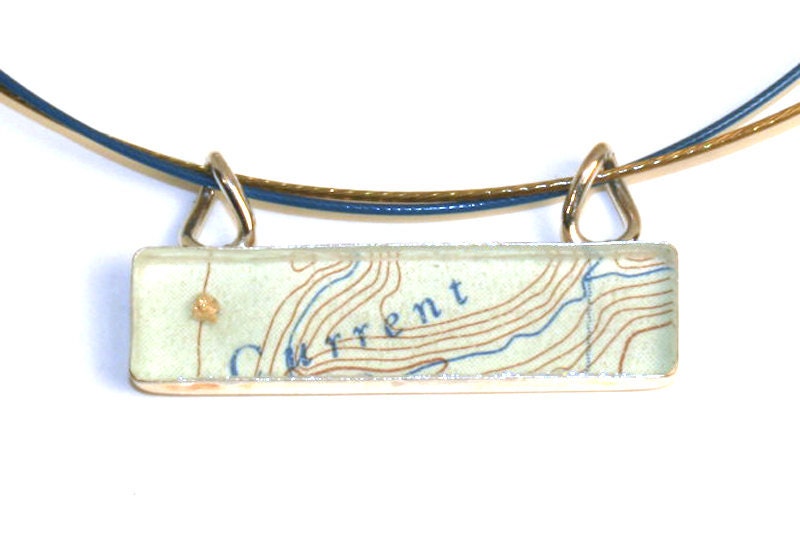 Necklace made from topographic maps of Northern Canada