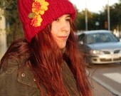 Red hat with crocheted flower- Repurposed