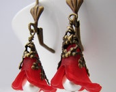 Red lucite flower drop earrings on antiqued brass earwires