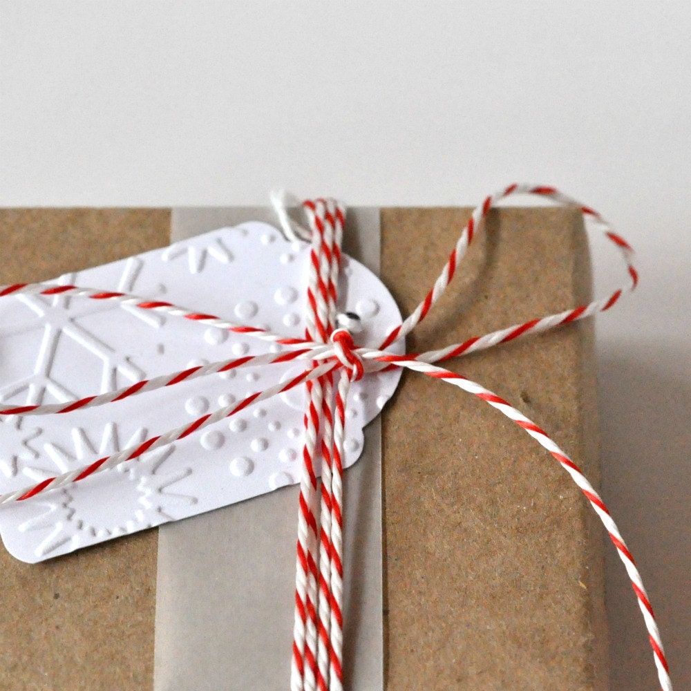 10 Embossed Snowflake Mini Tags Threaded White