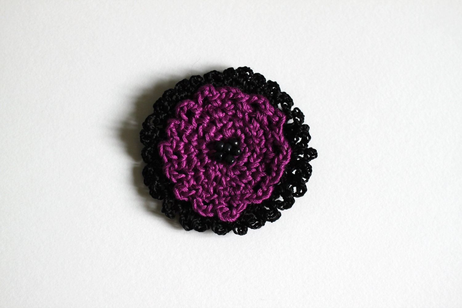 Black and purple crochet pin