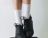 black leather .vintage. ankle boots