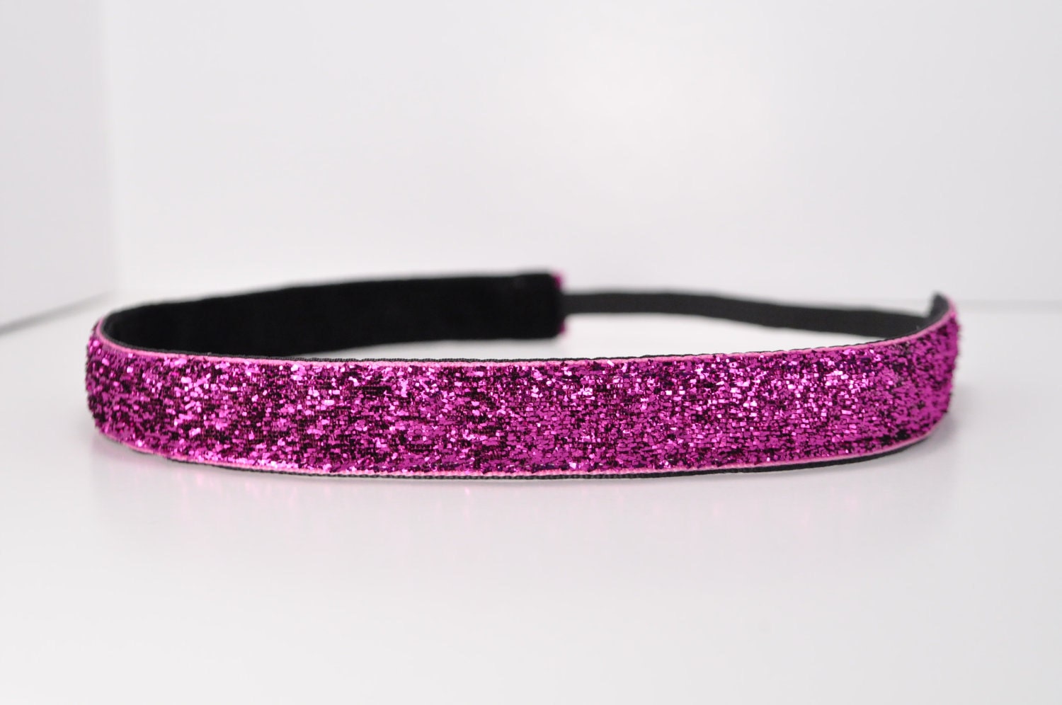 Band-It Headband.... Purple Glitter.  Will stay put and not slip.