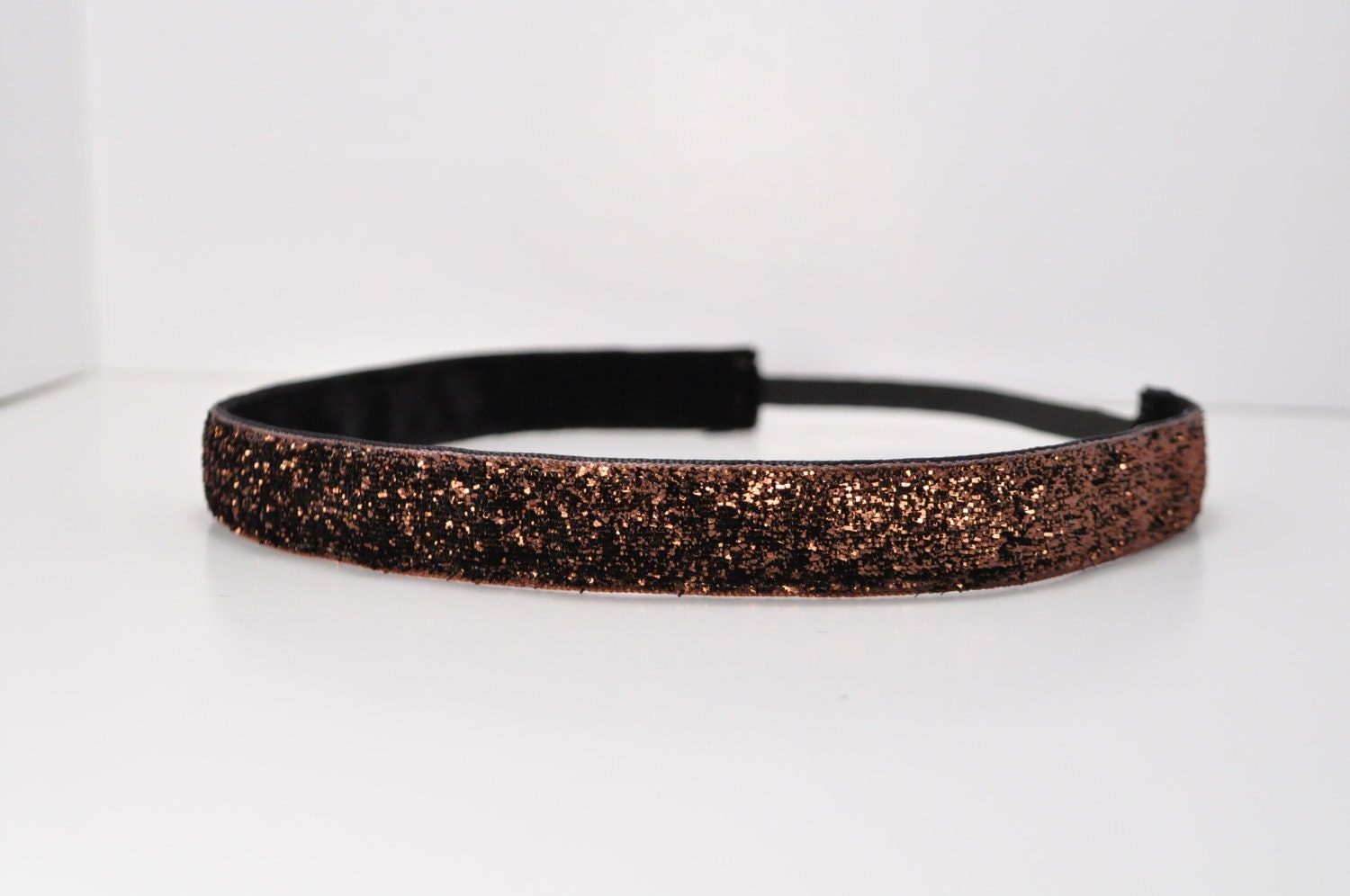 Band-It Headband.... Coffee Glitter.  Will stay put and not slip.
