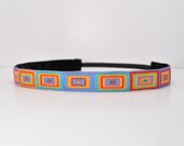 Band-It Headband.... Multi-color Cubic.  Will stay put and not slip.