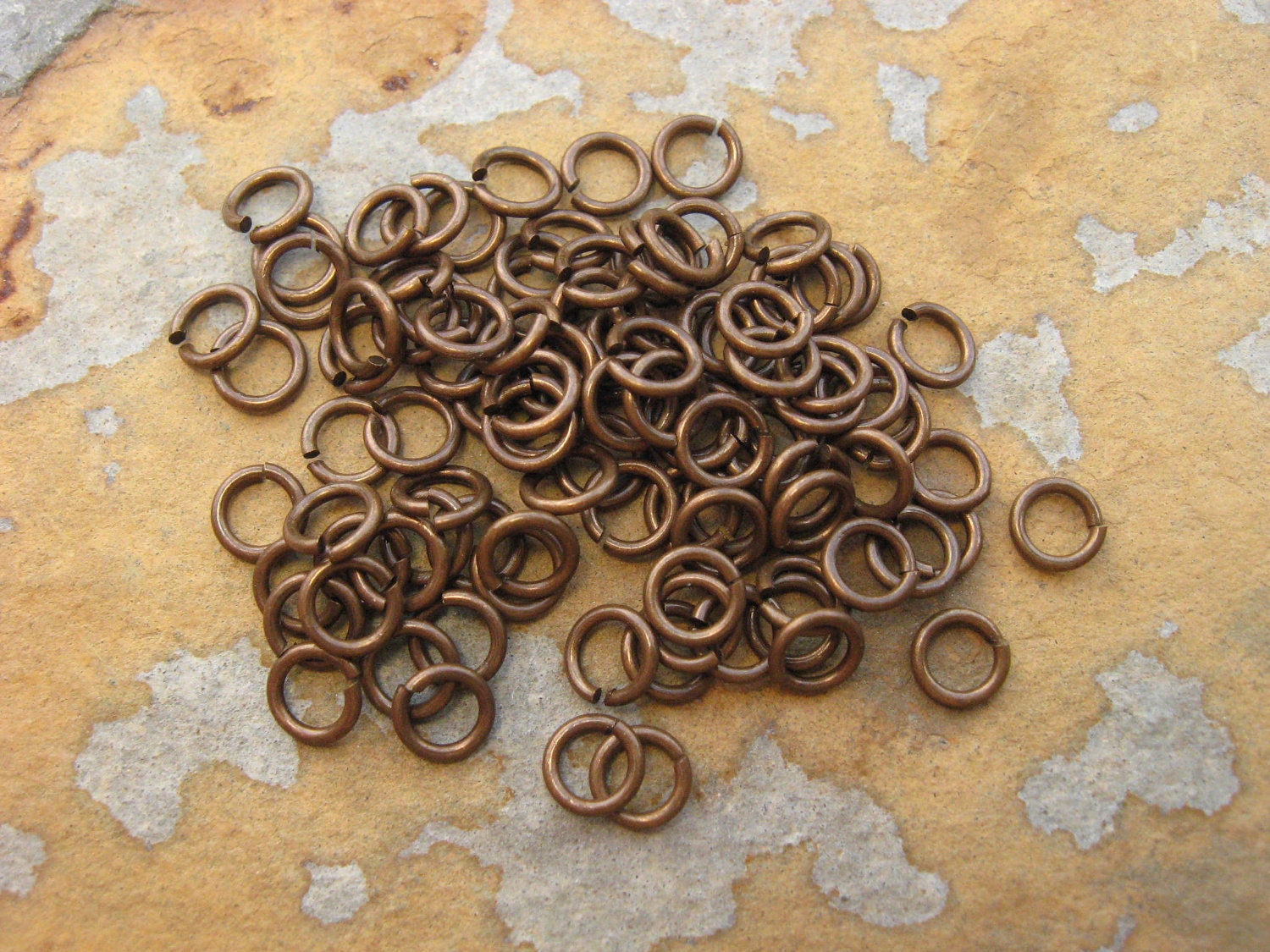 100 Trinity Brass Vintage Patina 4.5mm 20 Gauge Open Jumprings -  LOW SHIPPING