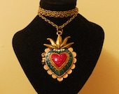 Unusual circus-style colourful heart-shaped locket on an antique-brass-tone chain