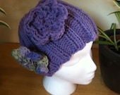 Purple knitted beanie hat with cute detachable flowers