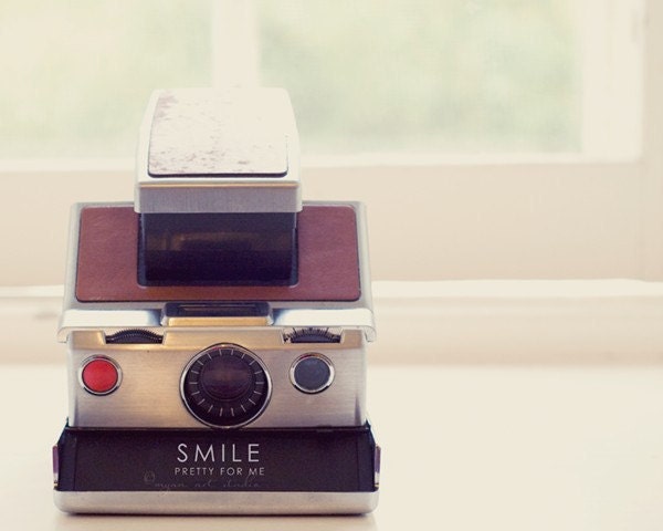 polaroid sx-70 vintage camera photograph "Smile pretty for me". photographer saying spring pastel color, childrens room