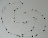 Hammered diamond and circle shaped linked necklace