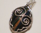 SALE (was 36.00) Rainbow Calsilica sterling silver wire wrapped pendant