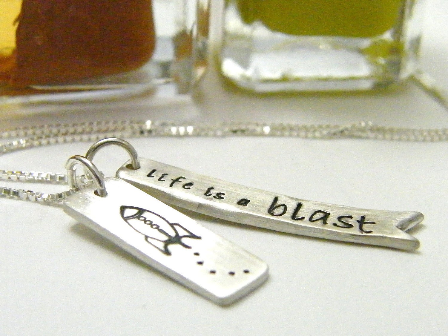 rocket ship necklace hand stamped sterling silver tag life is a blast