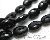 4 Black Spinel 9-10mm faceted flattened oval beads