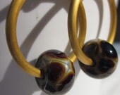 Giraffe Hoop Earrings - animal print lampwork dangles from gold hoops