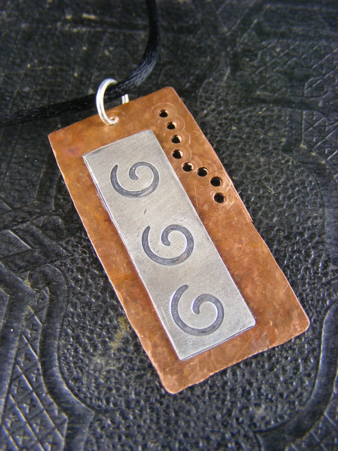 Silver and copper swirl necklace