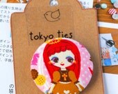 Kawaii Japanese Button Brooch- Mademoiselle with cookies and crown