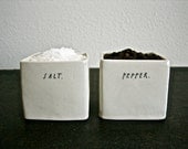 square SALT and PEPPER cellars.