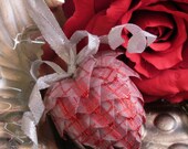 red and white handmade ribbon heart ornament