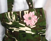camouflage and pink purse