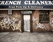 French cleaners - 8x12 or 8x10 photography print of a store front with broken sidewalk and grafitti which is ironically a french cleaners