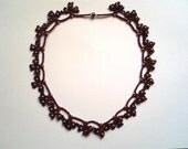 Purple beaded necklace lace-like
