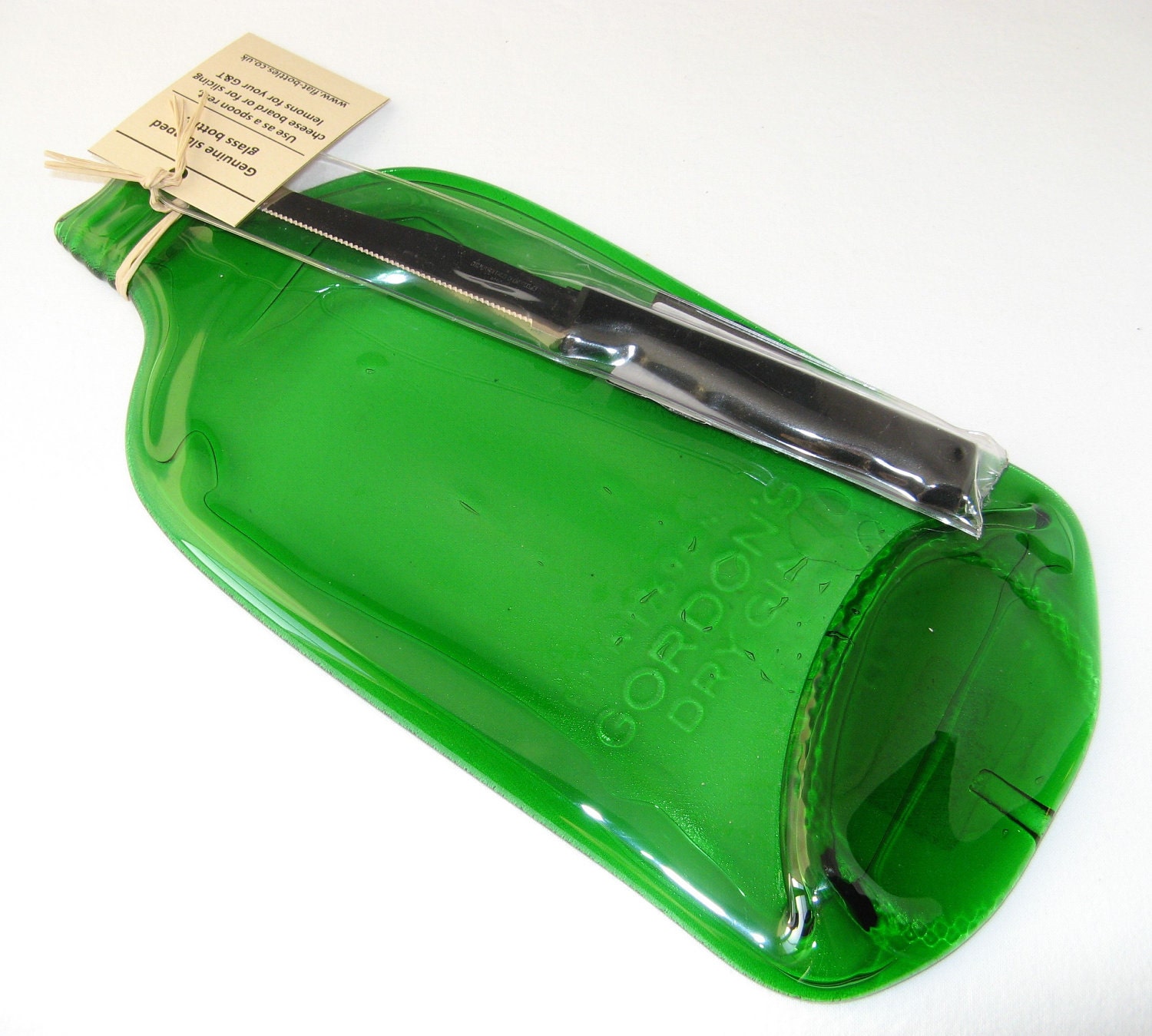 Flat Gordon's gin bottle cheeseboard with knife- flattened bottle, melted bottle