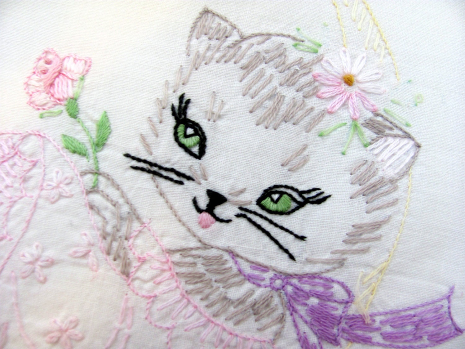 vintage embroidered pillowcase with seductive cat