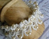 Bridal bracelet cuff in micro macrame with vintage pearls. Handmade wedding jewelry.