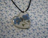 Off Centered Forget Me Not Resin Heart Pendant