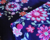 Diaper and wipes pouch with snap closures