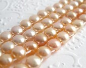 Pearls, double drilled buttons, peach, 6mm, 16 inch full strand