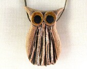 Vintage Pottery Owl Figural Pendant on leather strap.