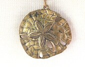 Vintage Gold tone metal Sand Dollar Pendant Necklace
