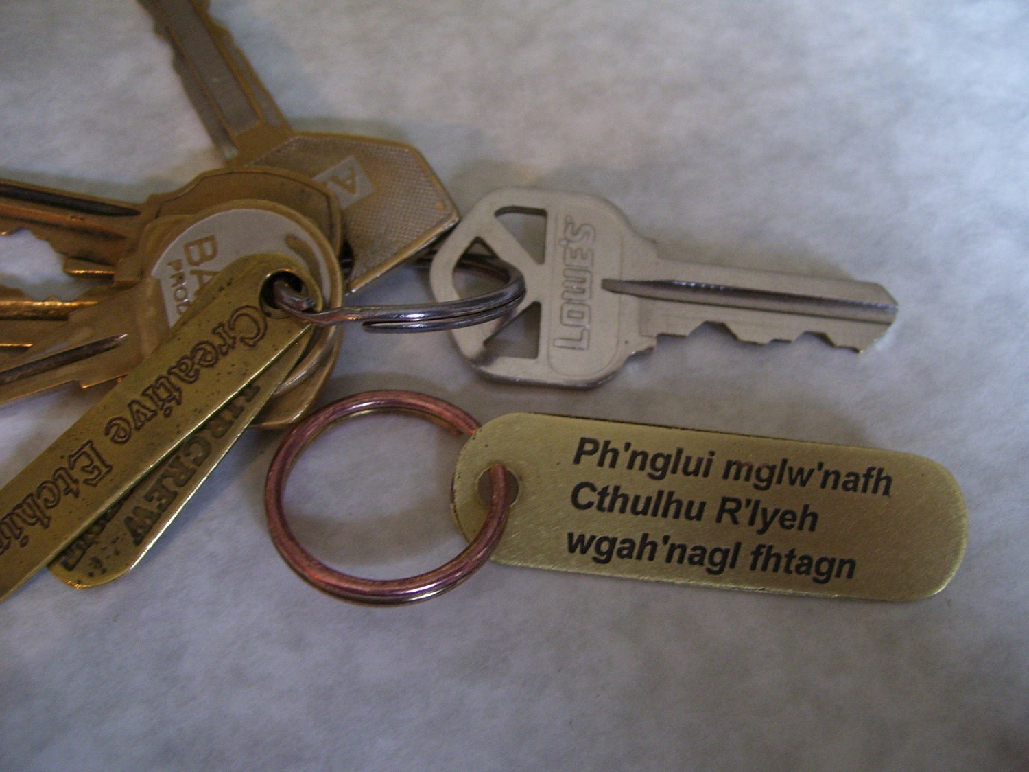 Cthulhu inspired etched brass keychain
