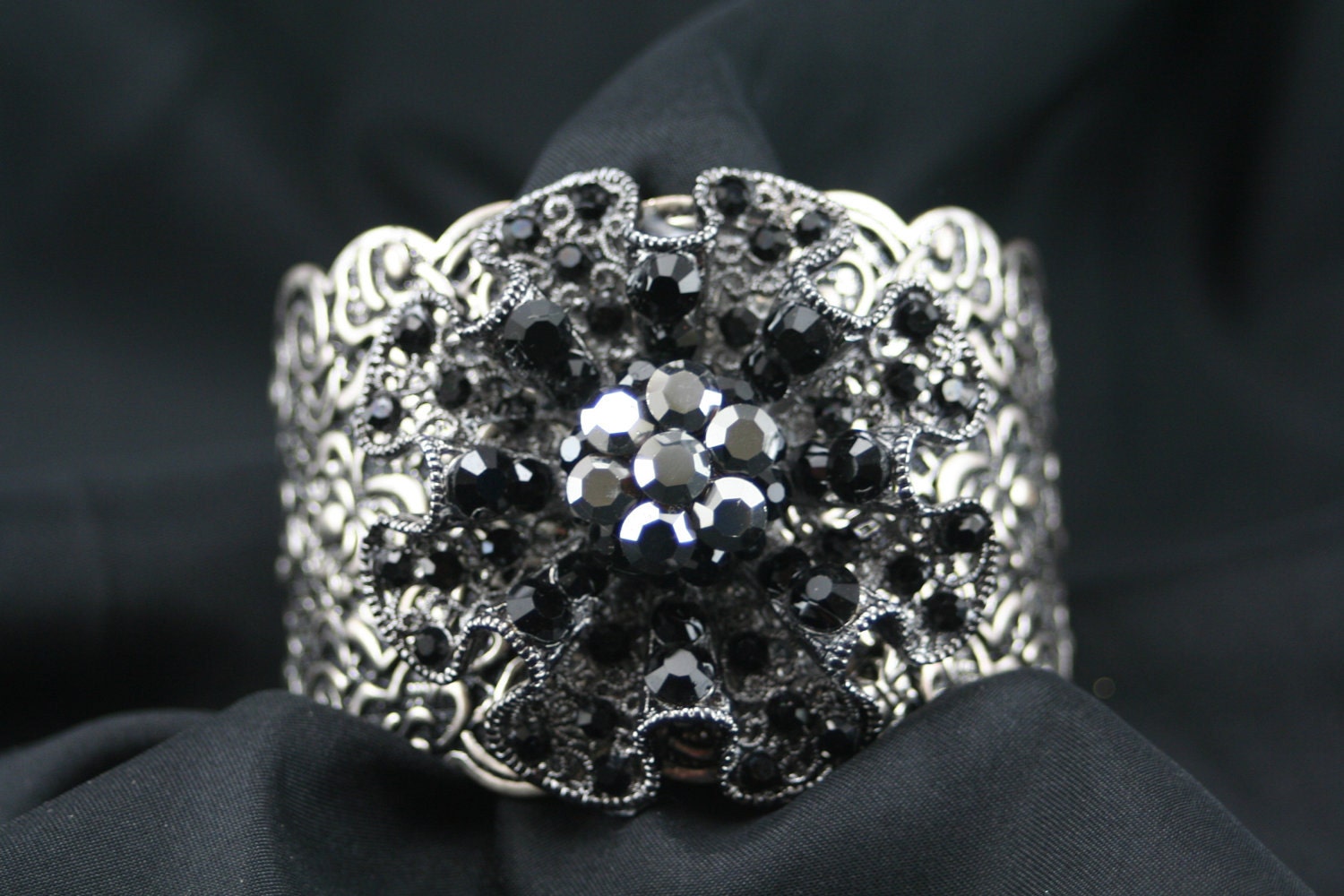Cuff With A Antique Flare With Black Emellsihment
