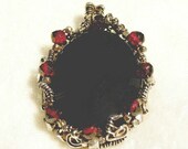 Artisan Black Onyx and Faceted Garnet Sterling Silver Pendant