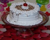 Fake Faux White Cake Chocolate Caramel Drizzle Pecan Slivers Cherry on Top House Staging, Home Decor Kitchen Centerpiece Stage Photo Prop