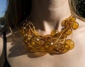 Playful Amber Gold Glass Float Necklace
