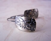 Asymmetrical silver earrings