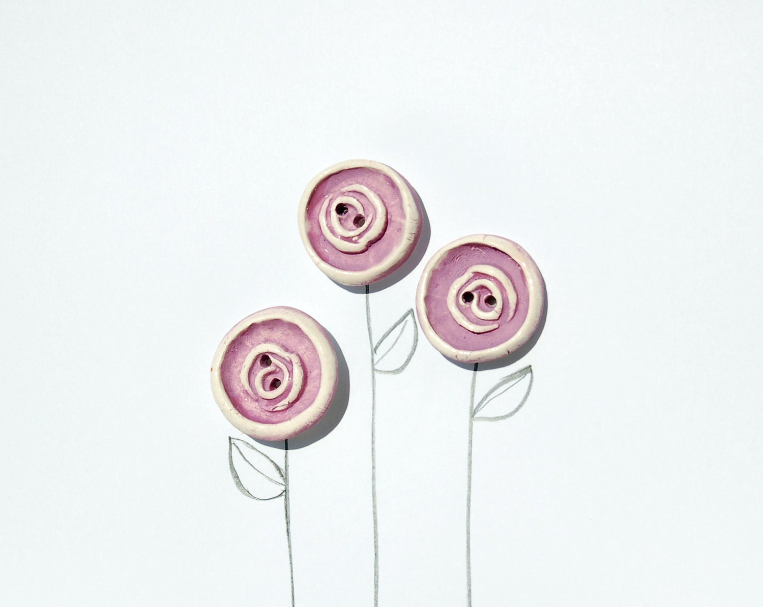 Rose buttons in a lilac glaze