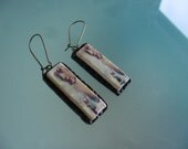 Polymer clay earrings featuring  surfer girl