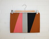 Angled clutch. Tan.