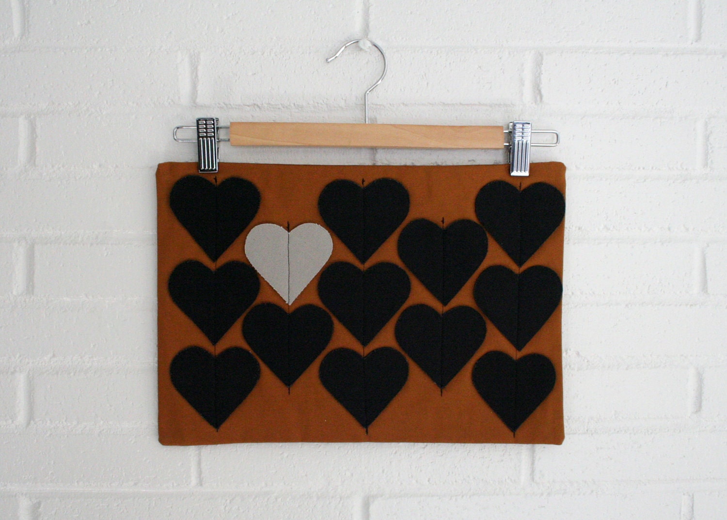Heartstrings zipper clutch purse in Nutmeg with Black/Grey hearts.