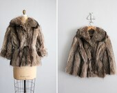 1970s vintage raccoon fur tie coat