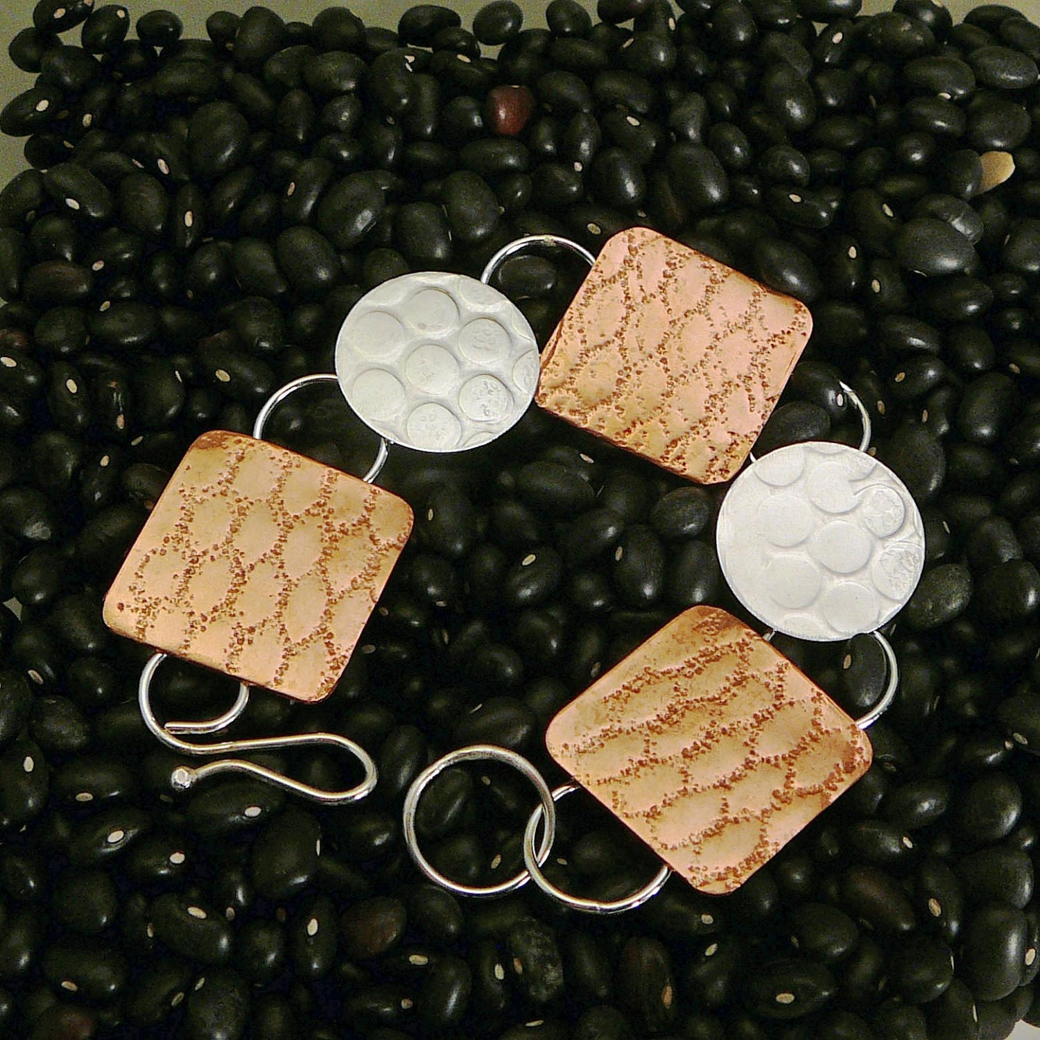 Textured silver and copper link bracelet
