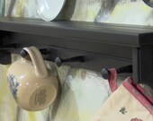 26" black wooden shelf for knik knack, plates  pegs made USA