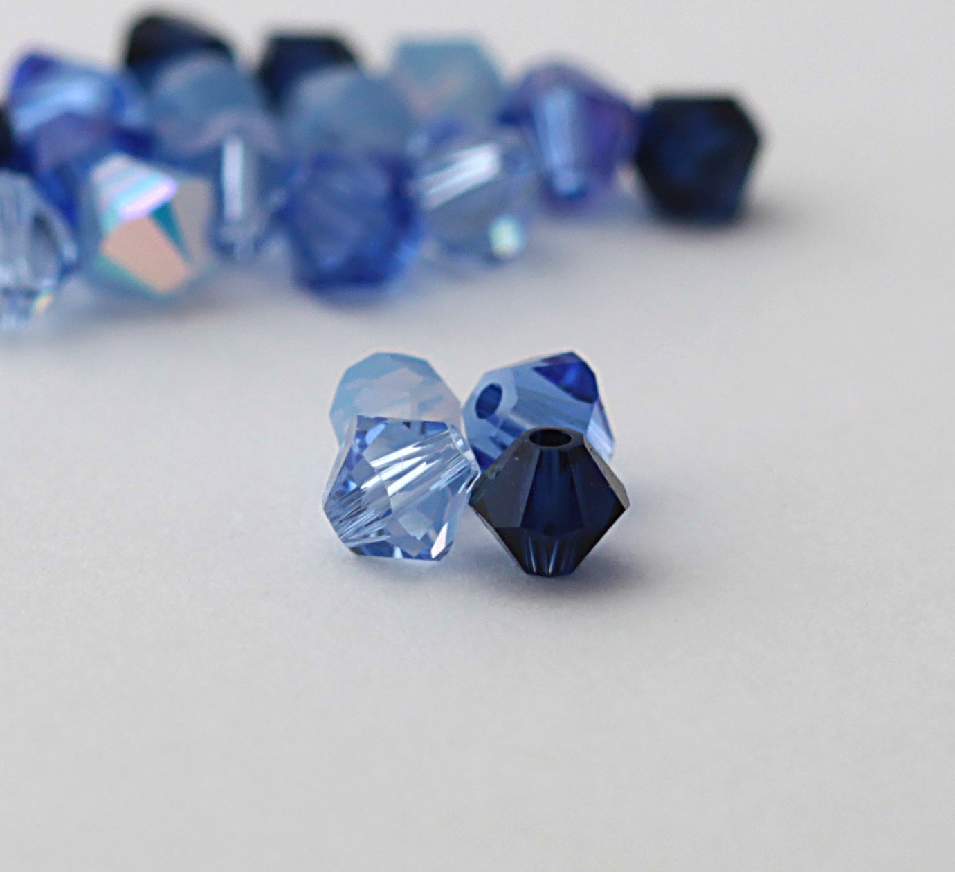 Swarovski Crystal Elements - 40,  4 mm bicone crystals - Brillant Blue Mix