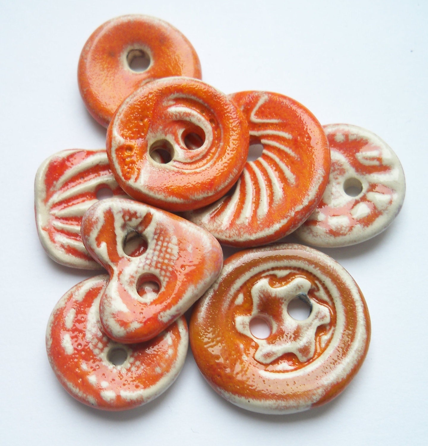 A Collection of Tangerine Orange Ceramic Buttons